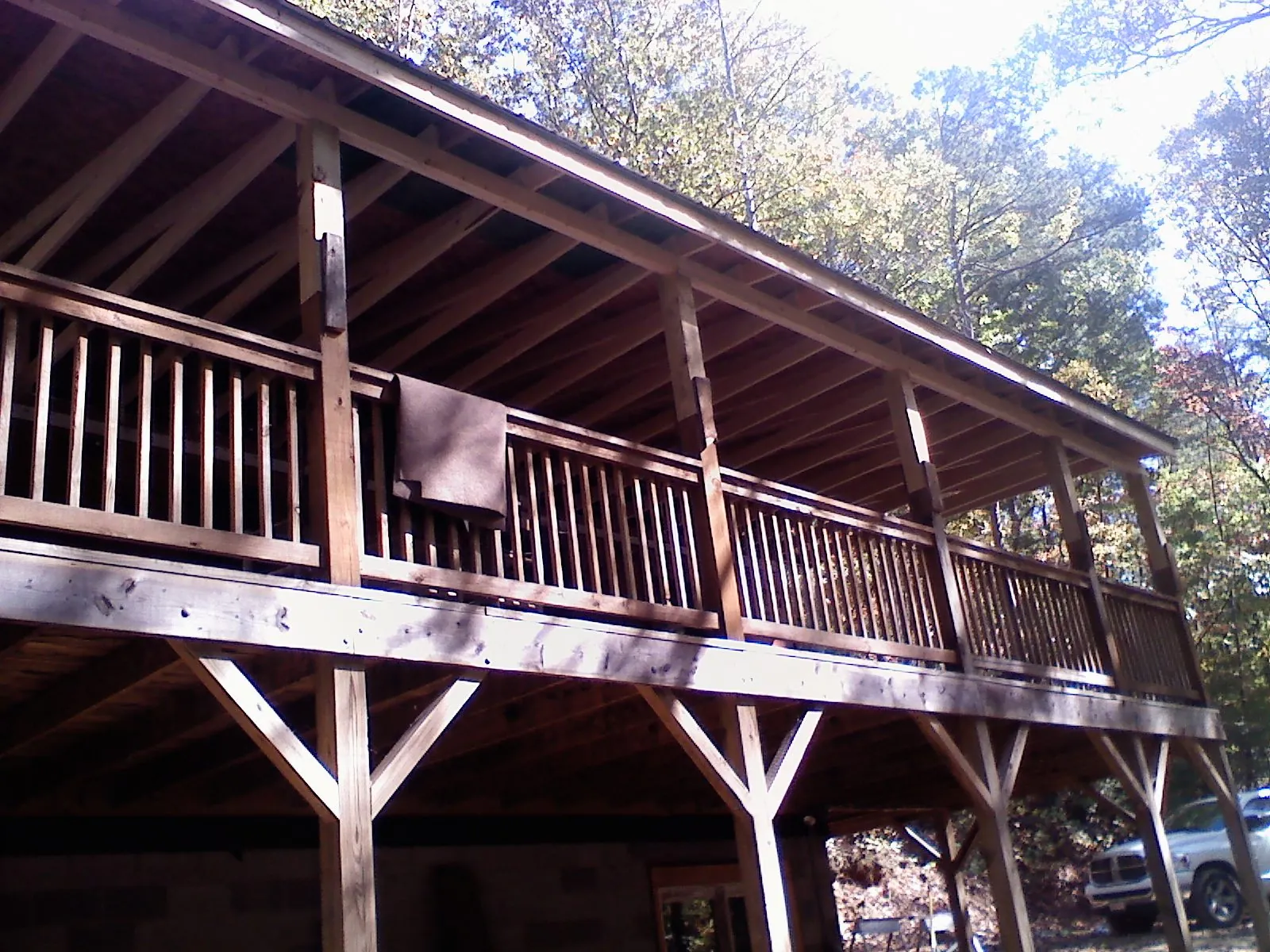 Timber framing under a new elevated porch and deck — Roof Leak Repair in Mackinaw by Roofing Brothers